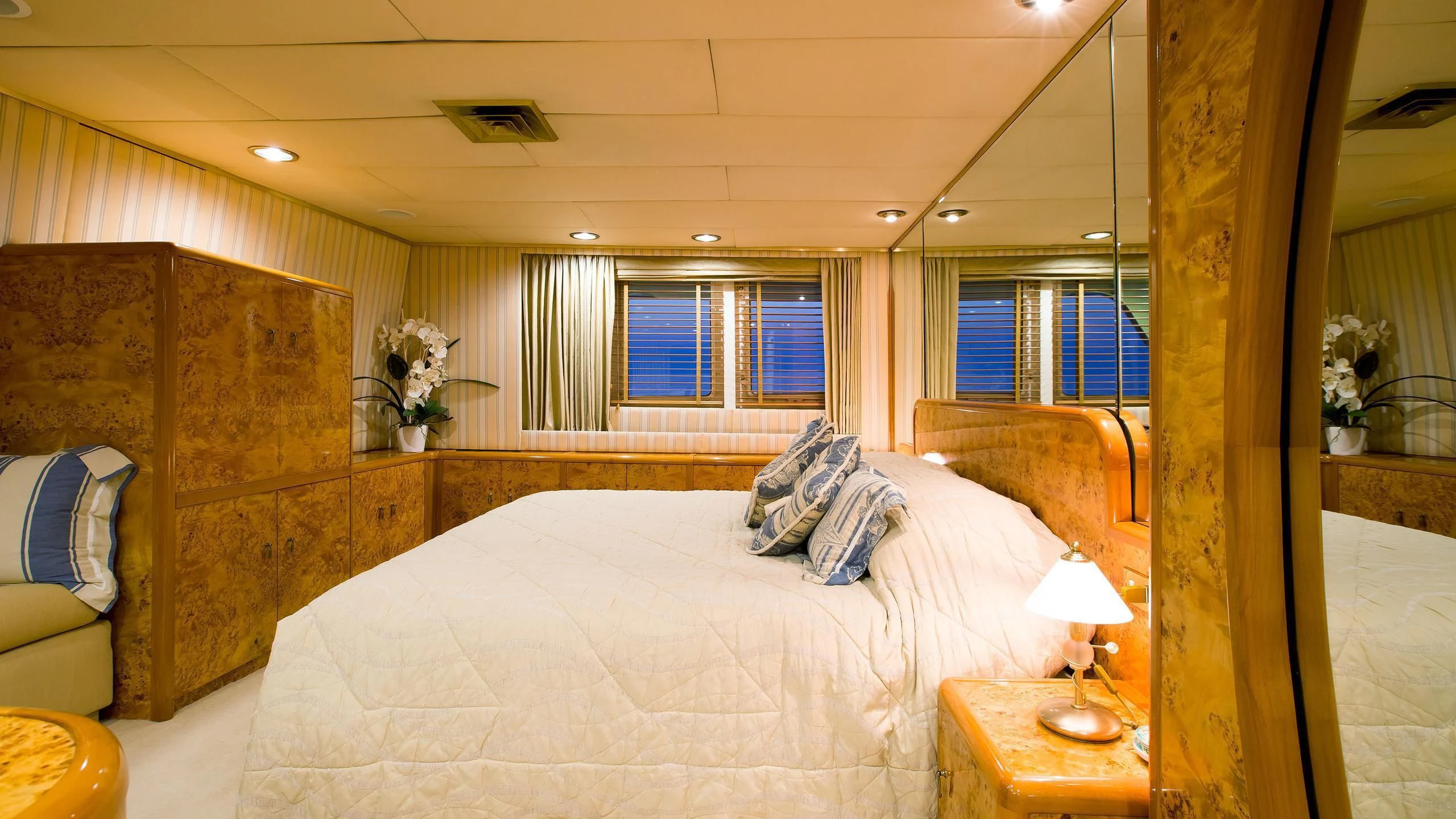 a bed in a room aboard ESMERALDA Yacht for Sale