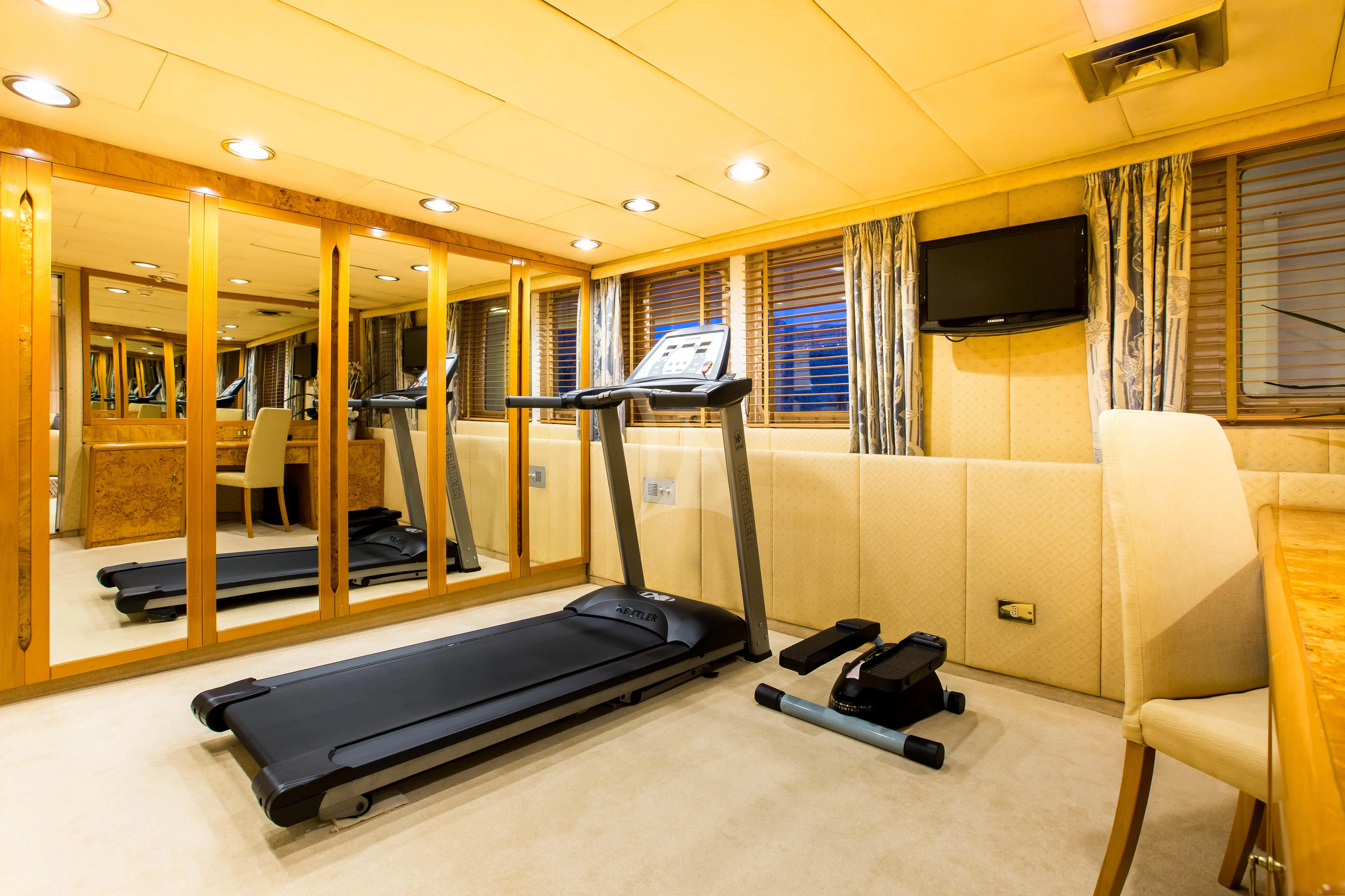 a room with a bed and a tv aboard ESMERALDA Yacht for Sale