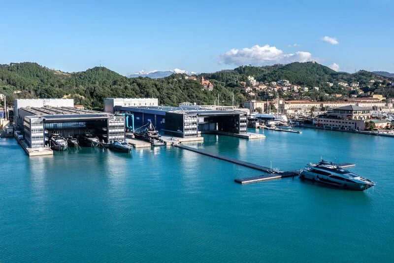 a body of water with boats and buildings on the side aboard SEVEN Yacht for Sale