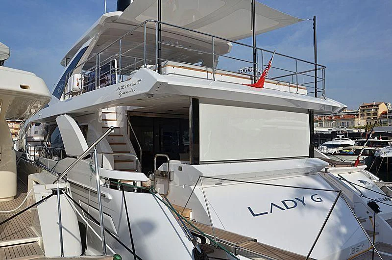 a boat docked at a pier aboard WAVE Yacht for Sale