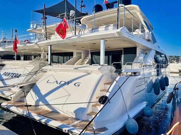 a boat docked at a pier aboard WAVE Yacht for Sale