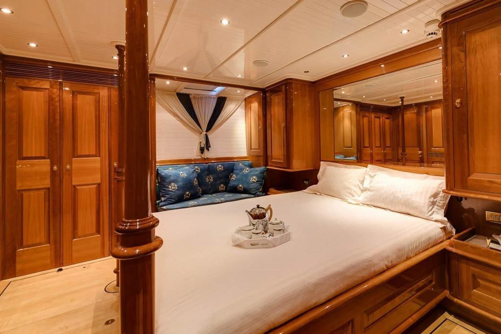 a large bed in a room aboard DELUSHA Yacht for Sale