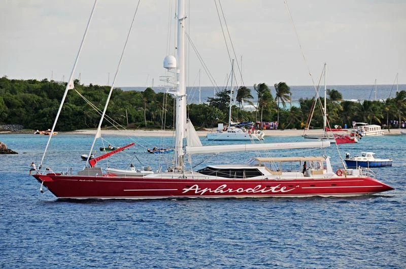 a red boat in the water aboard DELUSHA Yacht for Sale