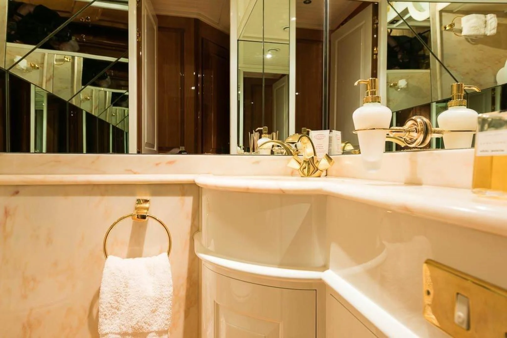 a bathroom with a bathtub and sink aboard DELUSHA Yacht for Sale