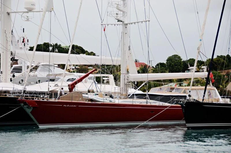 a group of boats are parked in the water aboard DELUSHA Yacht for Sale