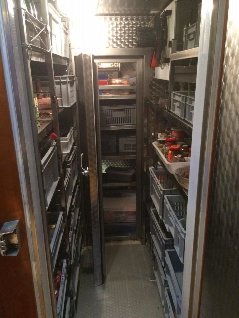 a room with shelves and a shelf aboard DELUSHA Yacht for Sale