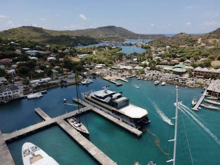 a bay with boats and houses aboard NEBULA Yacht for Sale