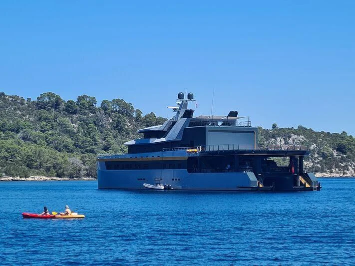 a large ship in the water aboard NEBULA Yacht for Sale