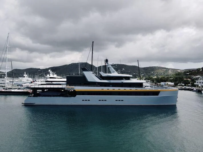a large white boat in the water aboard NEBULA Yacht for Sale