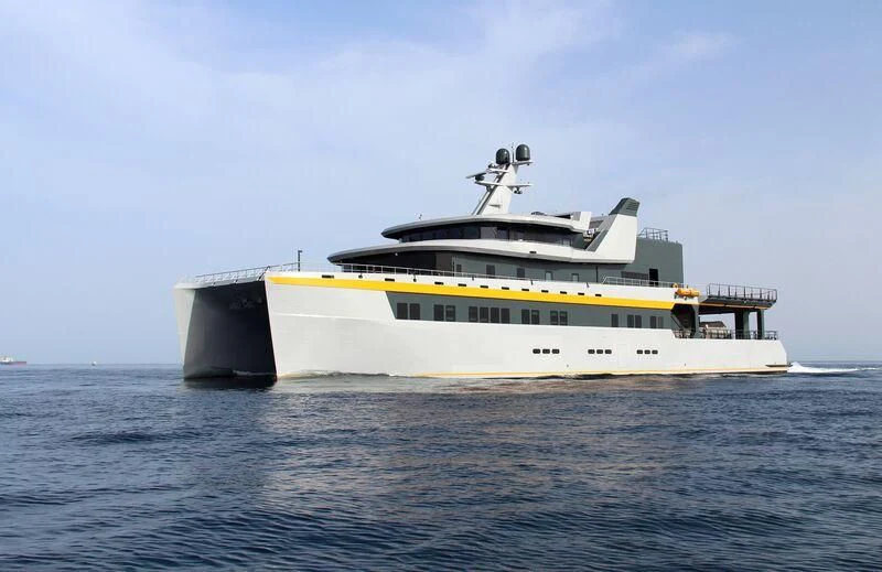 a large boat in the water aboard NEBULA Yacht for Sale