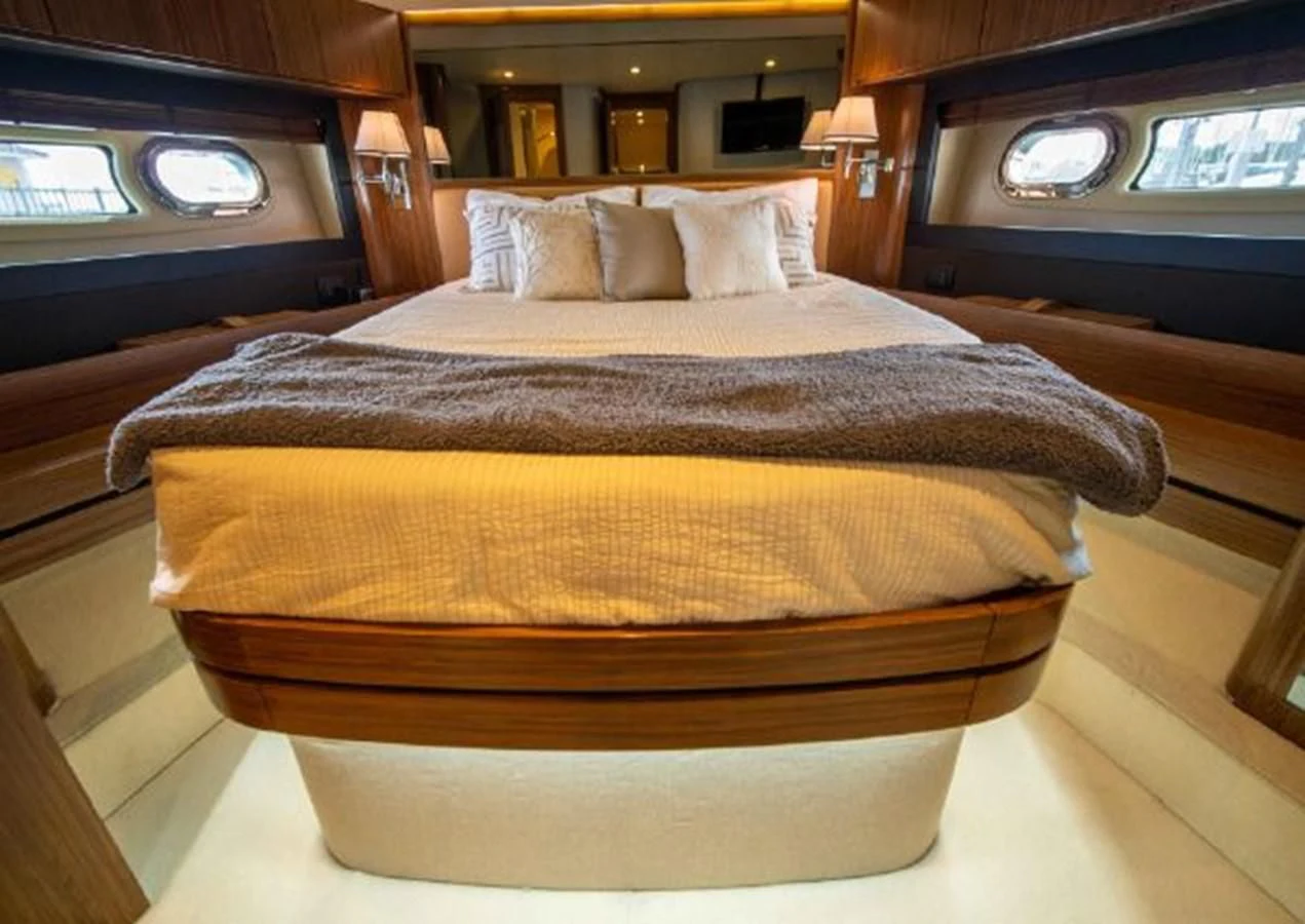 a bed in a room aboard 2016 AZIMUT MAGELLANO 66 Yacht for Sale