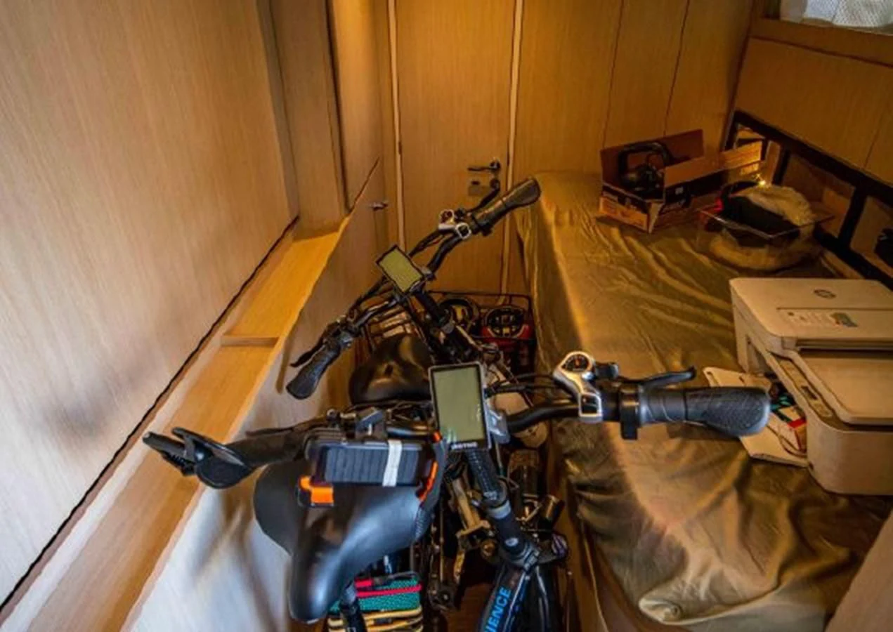 a bicycle in a room aboard 2016 AZIMUT MAGELLANO 66 Yacht for Sale