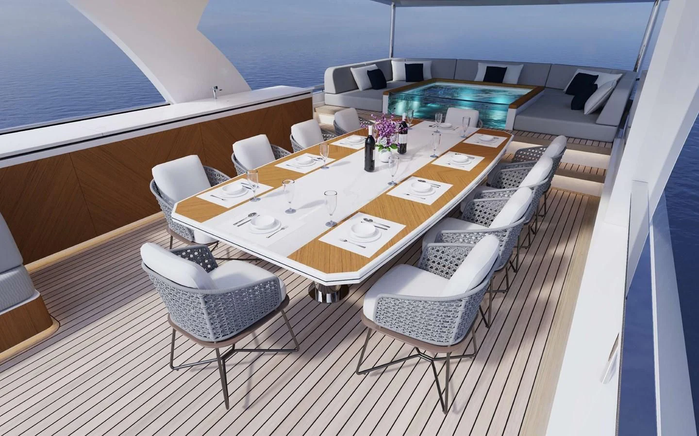 a room with a table and chairs aboard FAMILIA Yacht for Sale