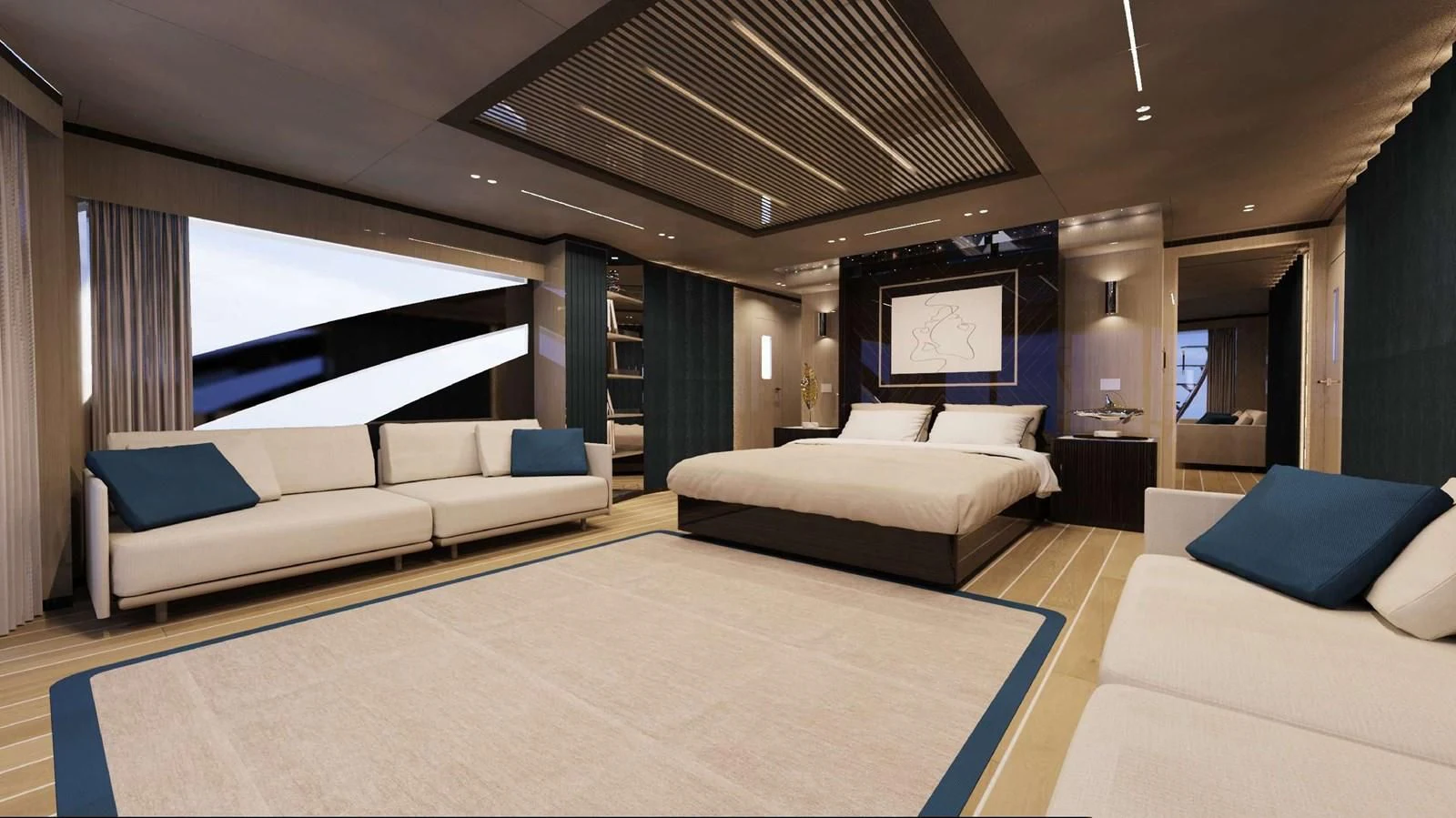 a large room with a bed and a couch aboard FAMILIA Yacht for Sale