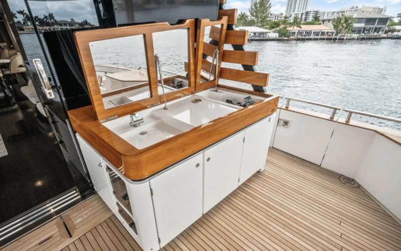 a boat on a deck aboard GAS Yacht for Sale