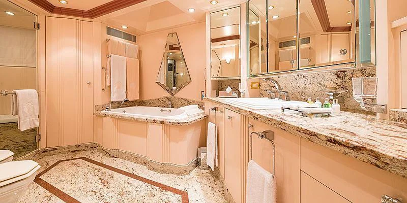 a bathroom with a large mirror aboard B5 Yacht for Sale