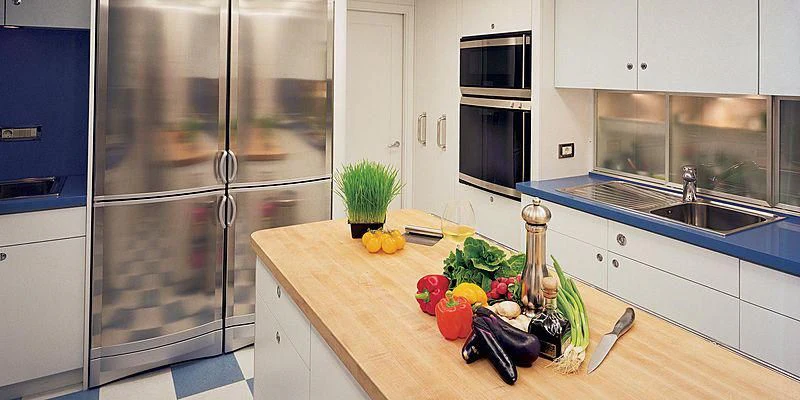 a kitchen with a stainless steel refrigerator aboard B5 Yacht for Sale