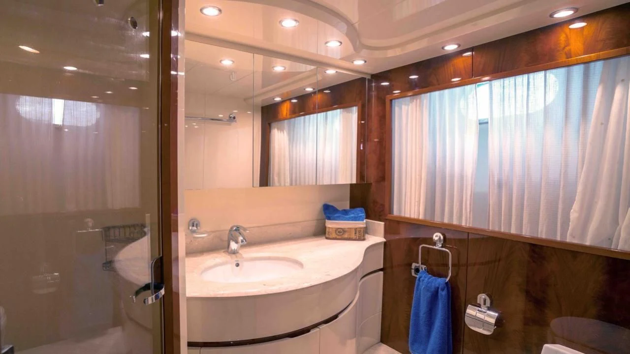 a bathroom with a sink and a shower aboard B5 Yacht for Sale