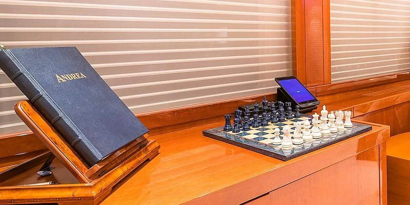 a game board and a game console aboard B5 Yacht for Sale