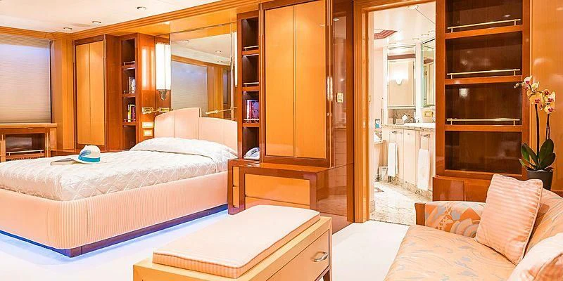 a room with a bed and a closet aboard B5 Yacht for Sale