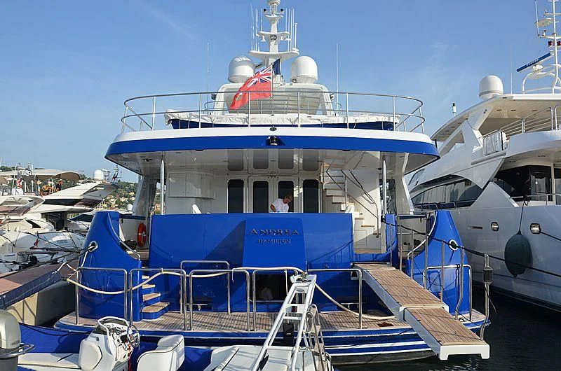 a boat docked at a pier aboard B5 Yacht for Sale