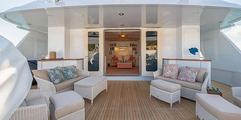 a living room with a wood floor aboard B5 Yacht for Sale