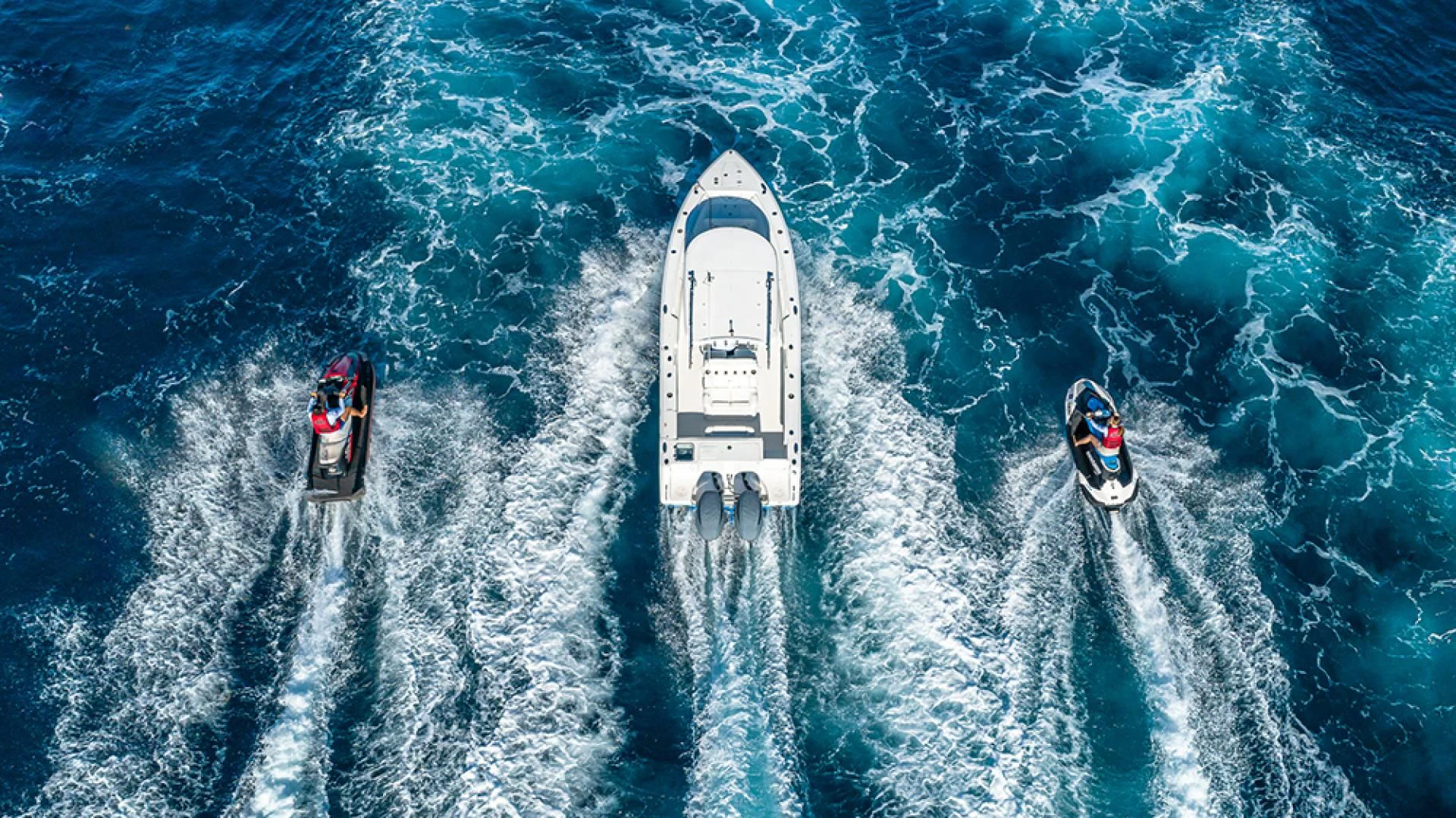 a couple of boats in the water aboard KEFI Yacht for Charter