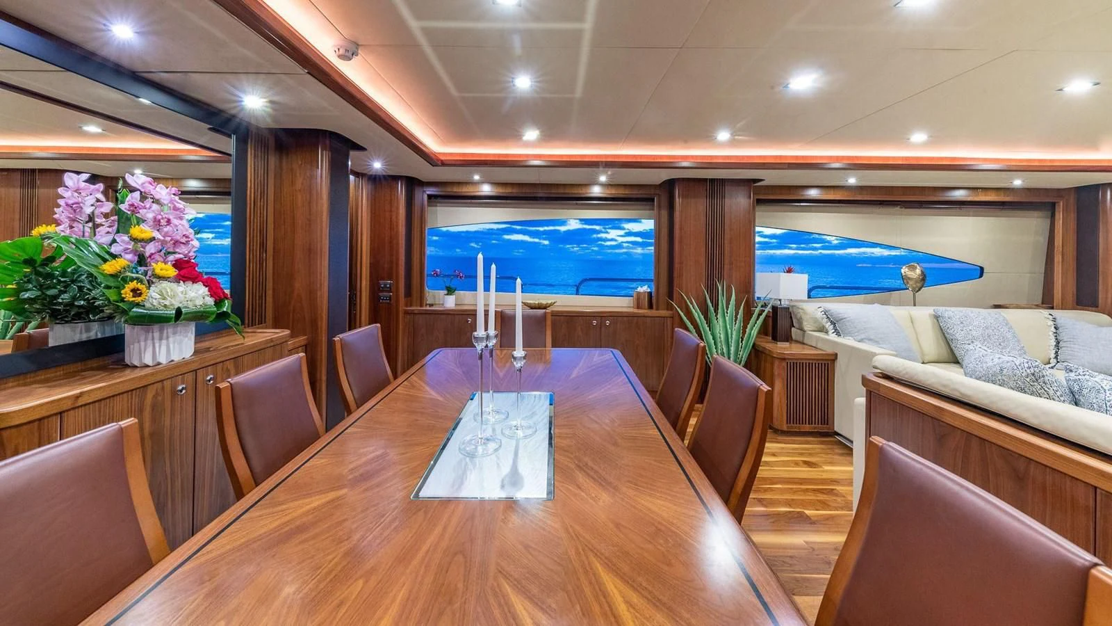 a room with a table and chairs aboard KEFI Yacht for Charter
