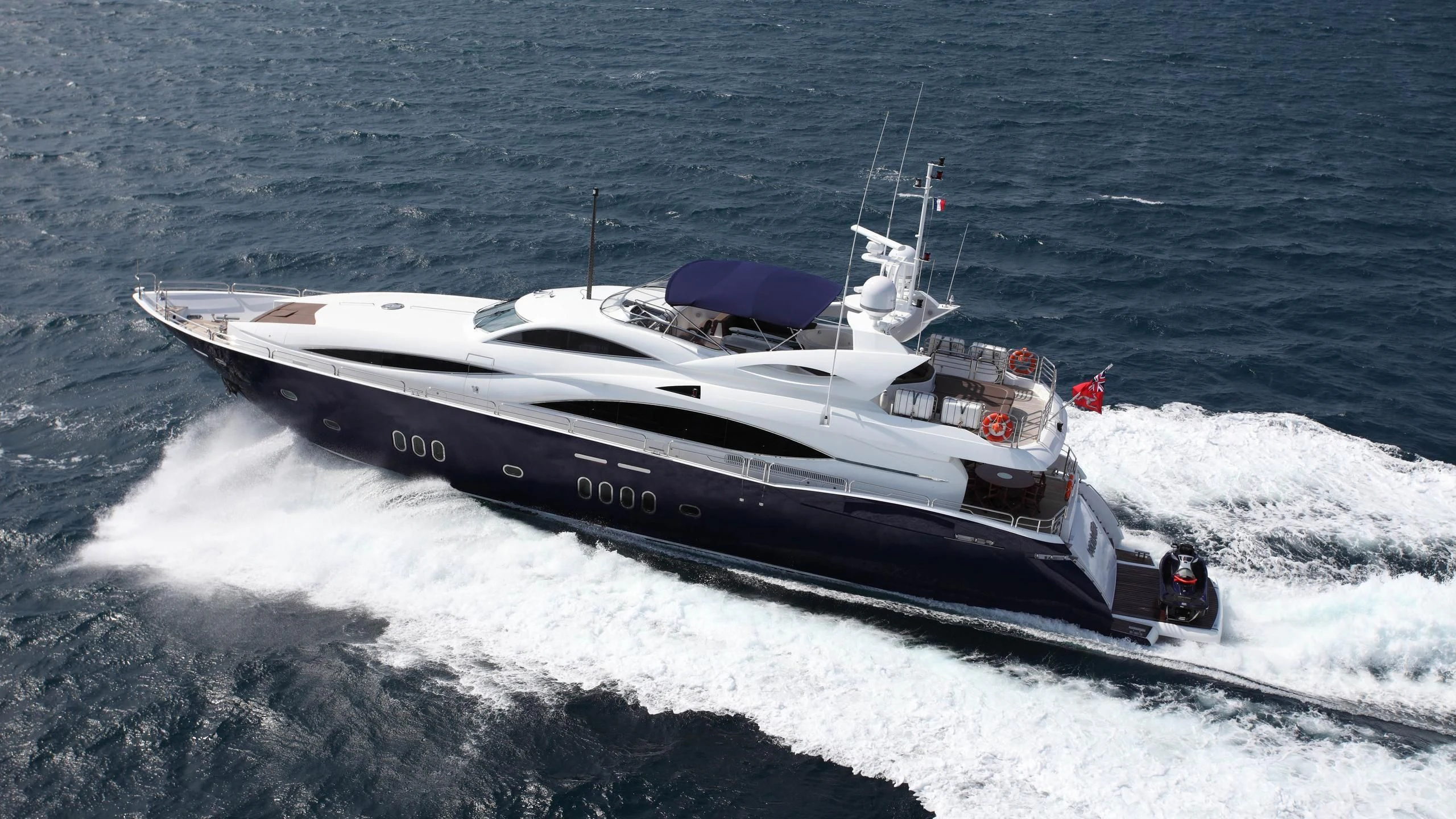 a white boat on the water aboard KEFI Yacht for Charter