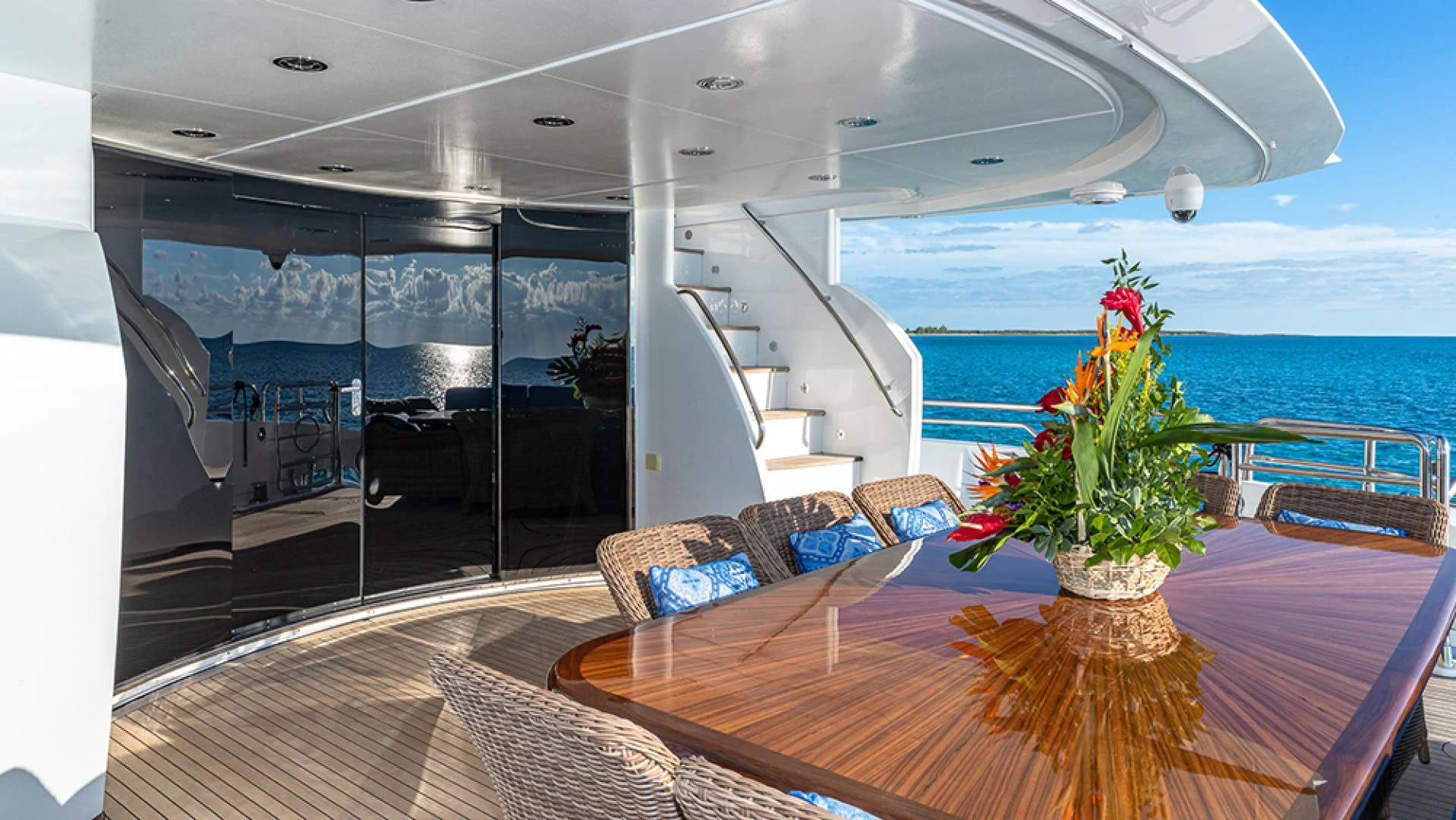 a room with a table and chairs aboard KEFI Yacht for Charter