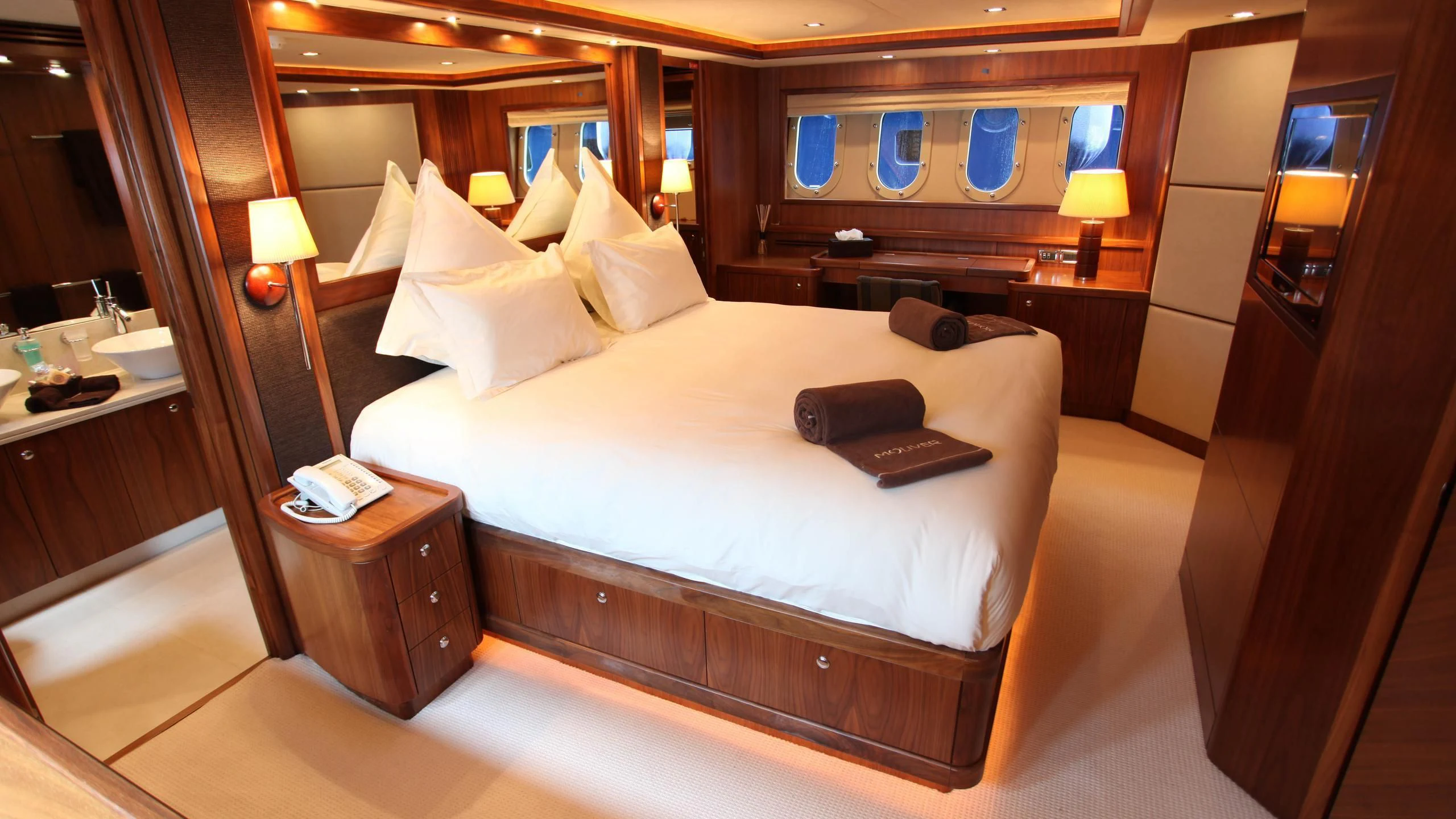 a hotel room with a bed aboard KEFI Yacht for Charter