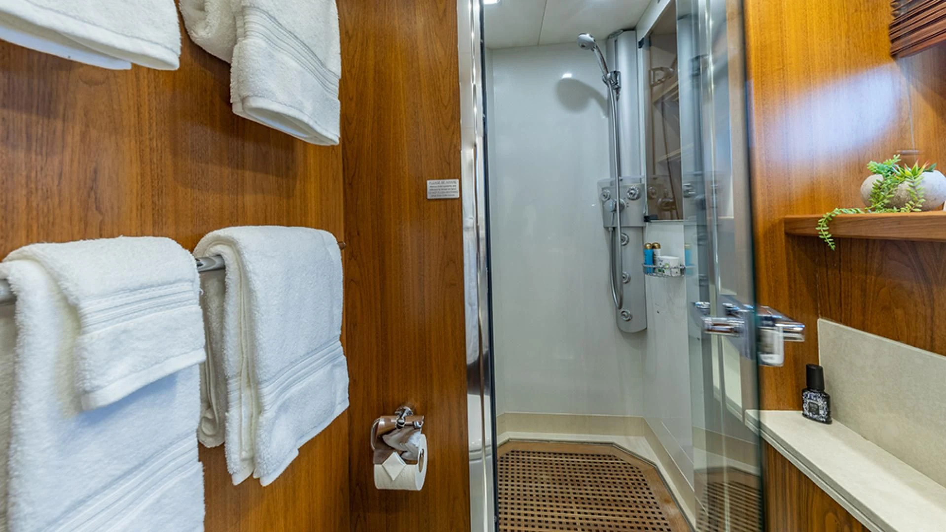 a bathroom with a shower and a sink aboard KEFI Yacht for Charter