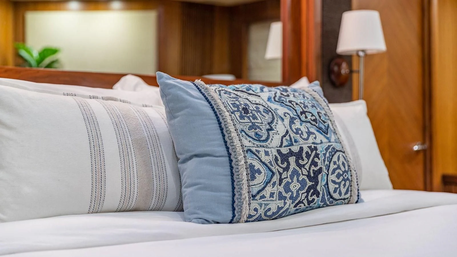 pillows on a bed aboard KEFI Yacht for Charter
