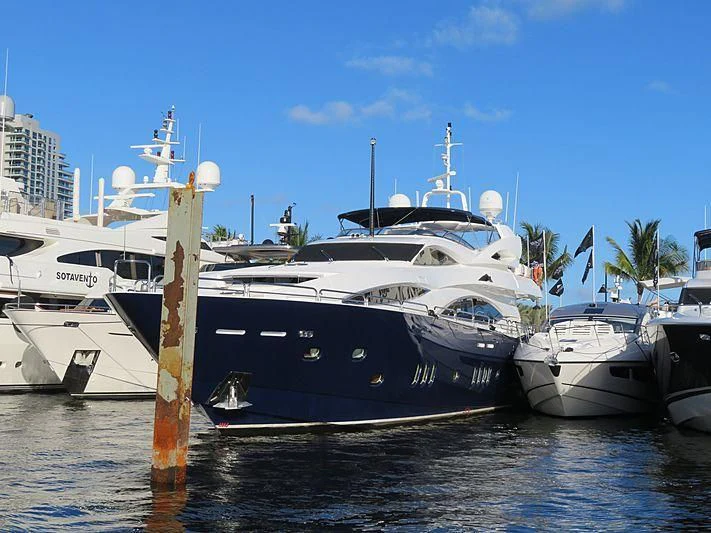 several boats docked in a harbor aboard KEFI Yacht for Charter