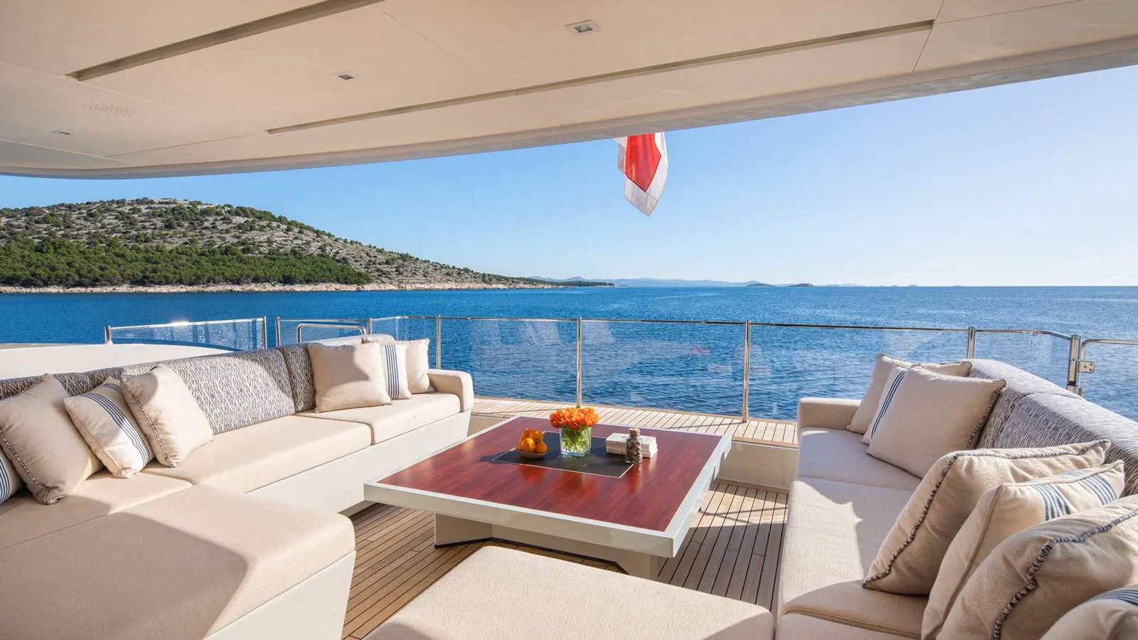 a living room with a large body of water aboard LAMMOUCHE Yacht for Sale