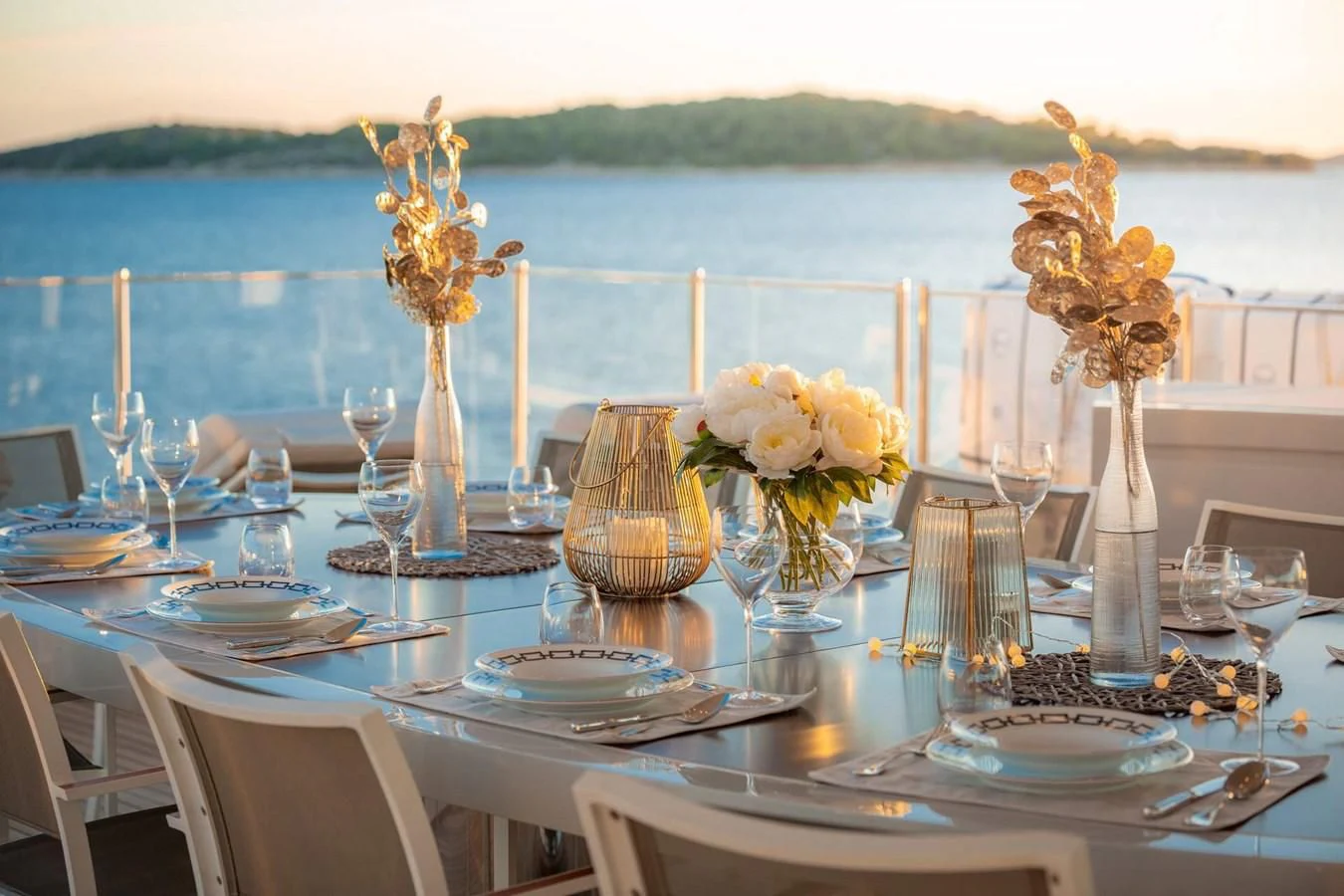 a table set for a dinner aboard LAMMOUCHE Yacht for Sale