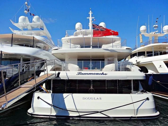 a group of boats in a harbor aboard LAMMOUCHE Yacht for Sale