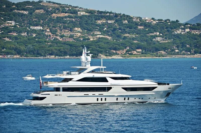 a white yacht in the water aboard LAMMOUCHE Yacht for Sale