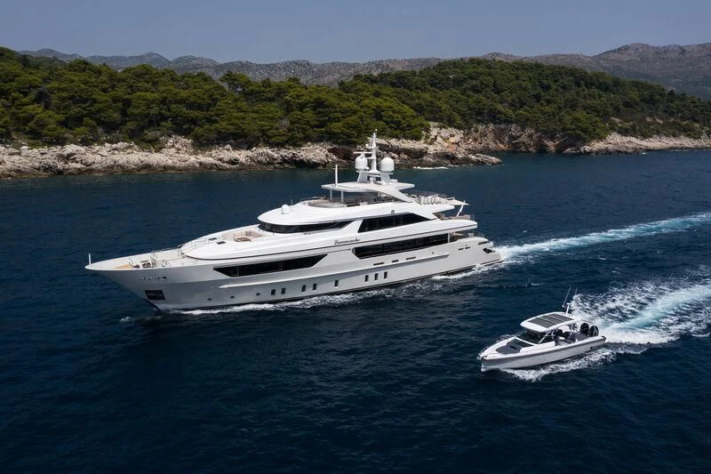a couple of boats sailing in the sea aboard LAMMOUCHE Yacht for Sale