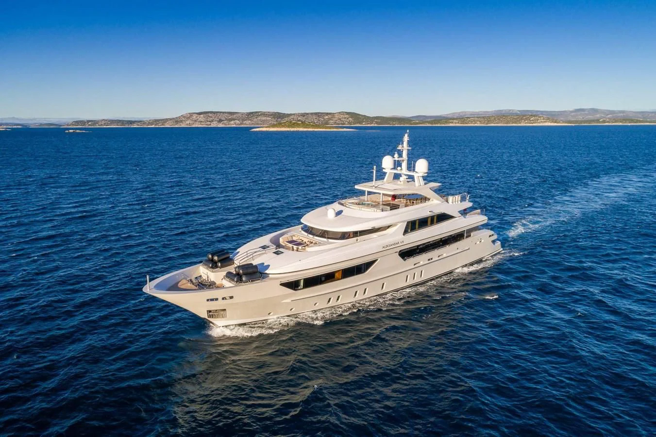 a white yacht on the water aboard LAMMOUCHE Yacht for Sale
