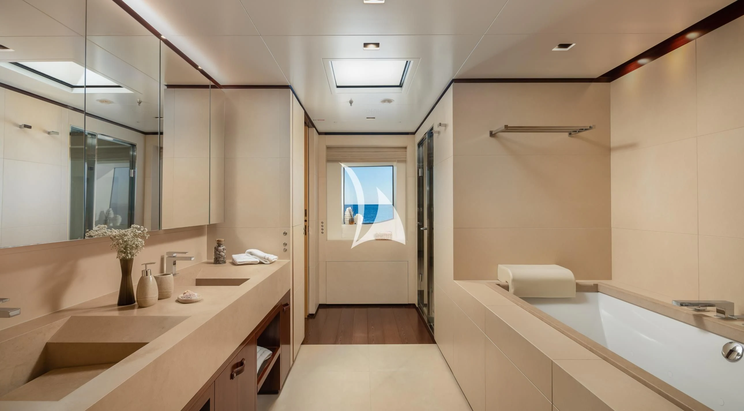 a bathroom with a large mirror aboard LAMMOUCHE Yacht for Sale