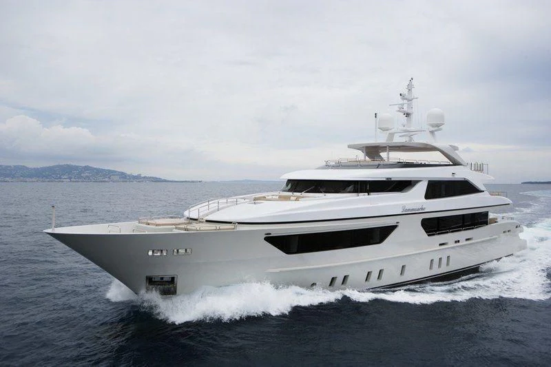 a white yacht on the water aboard LAMMOUCHE Yacht for Sale