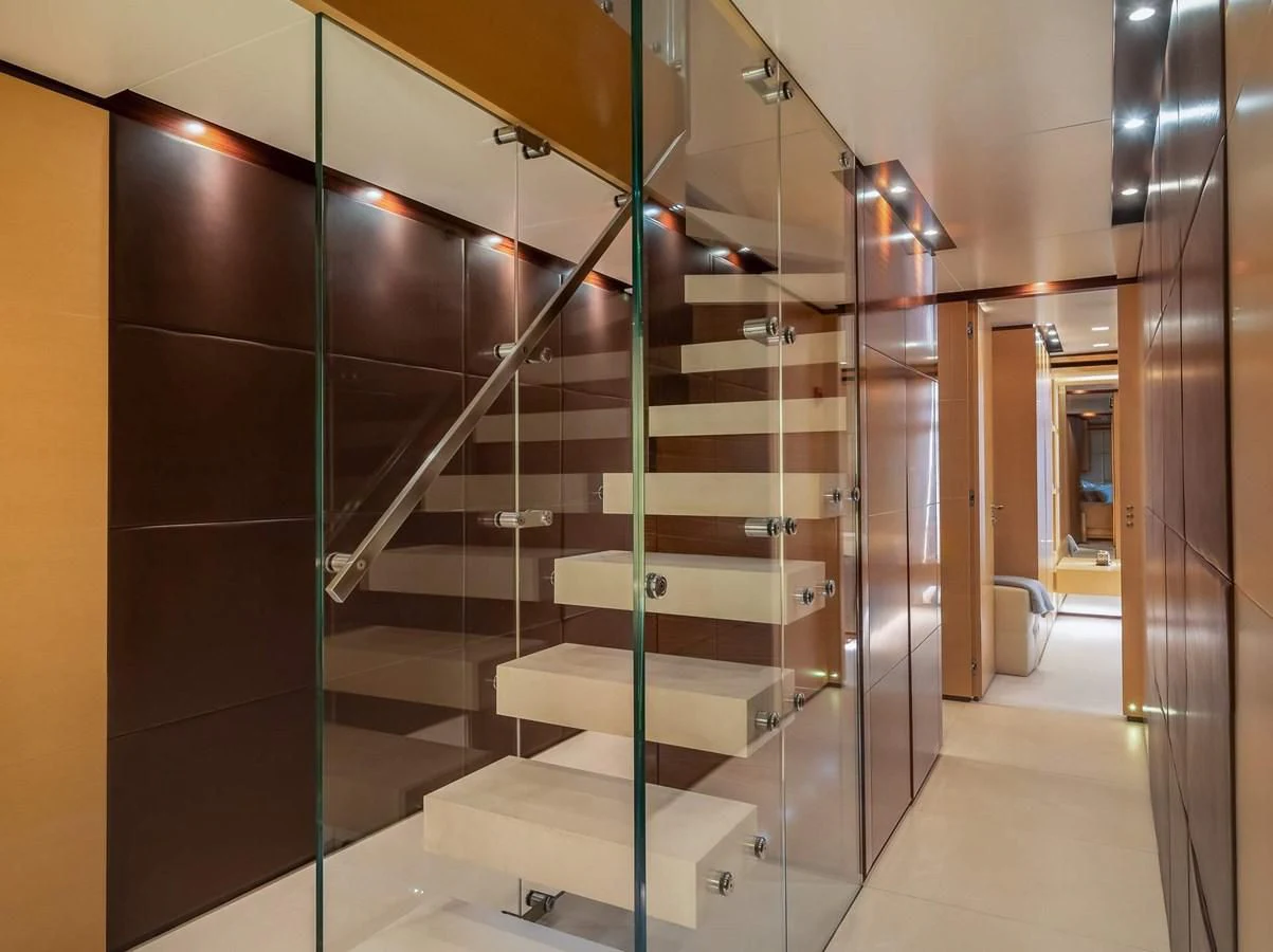 a bathroom with a glass wall aboard LAMMOUCHE Yacht for Sale