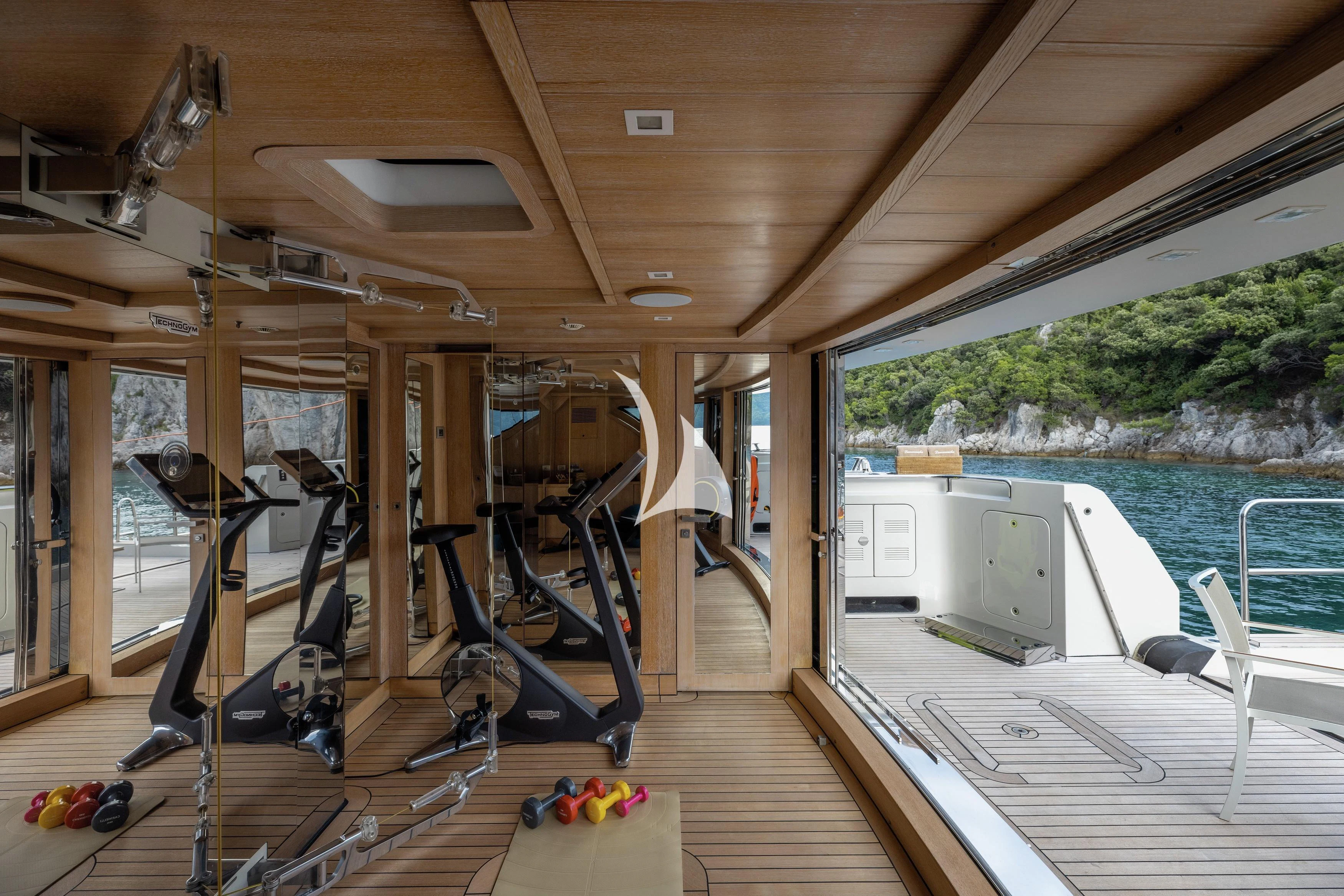 a boat on a deck aboard LAMMOUCHE Yacht for Sale