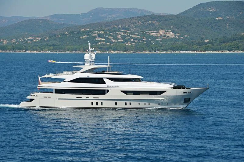 a white yacht in the water aboard LAMMOUCHE Yacht for Sale