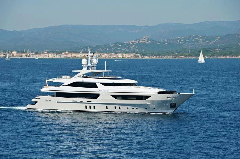 a white yacht in the water aboard LAMMOUCHE Yacht for Sale