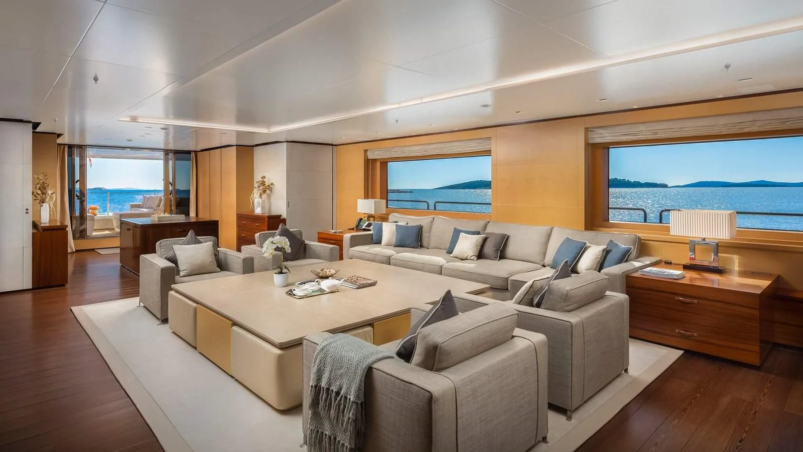 a living room with a large window aboard LAMMOUCHE Yacht for Sale