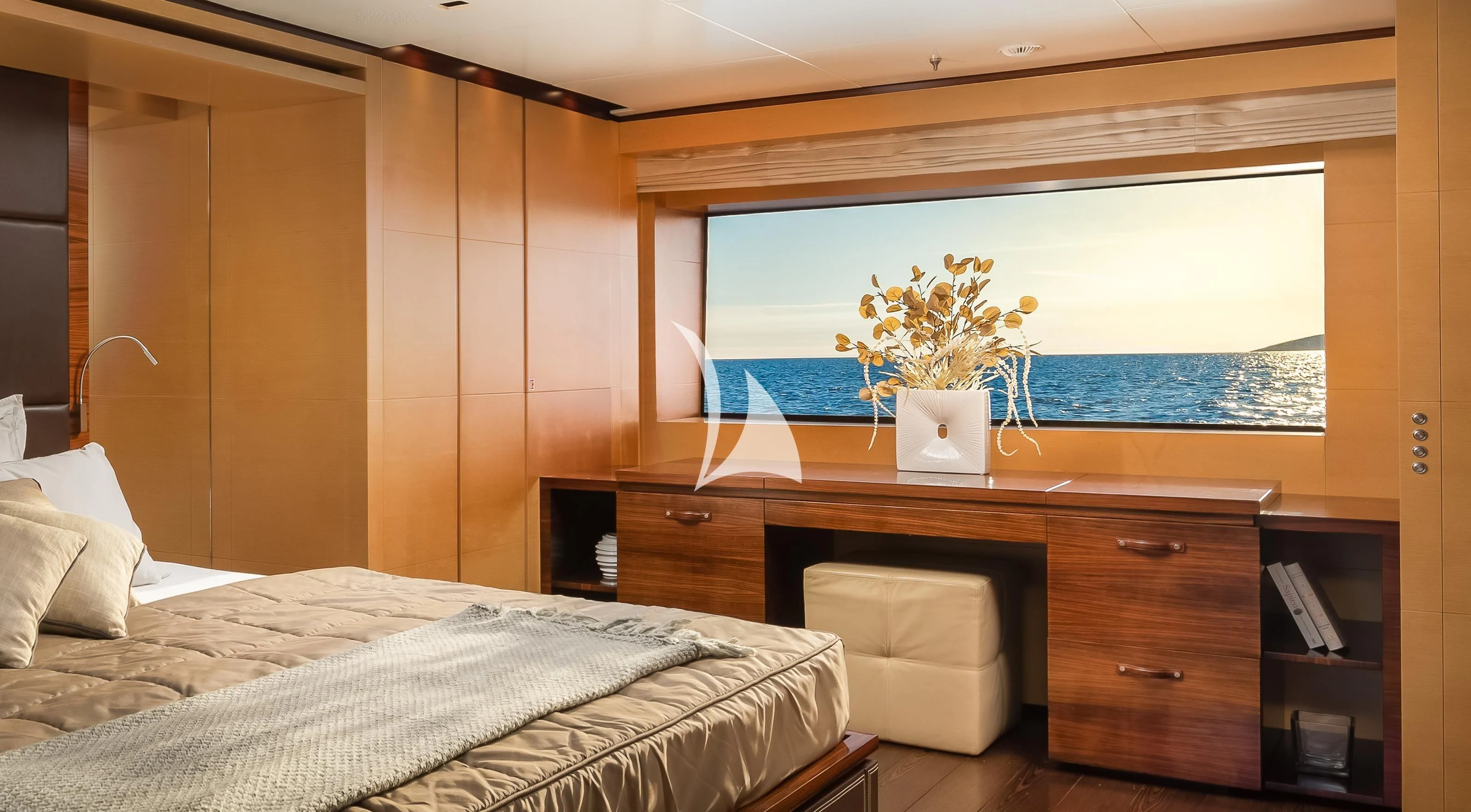 a room with a bed and a window aboard LAMMOUCHE Yacht for Sale
