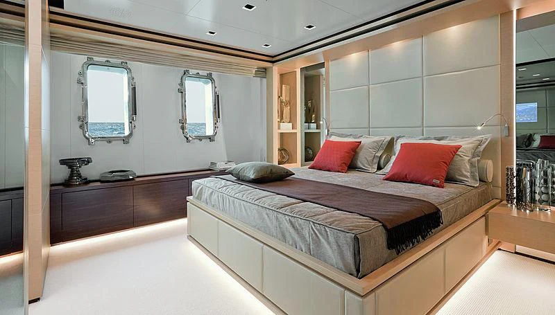 a large bedroom with a large bed aboard LAMMOUCHE Yacht for Sale