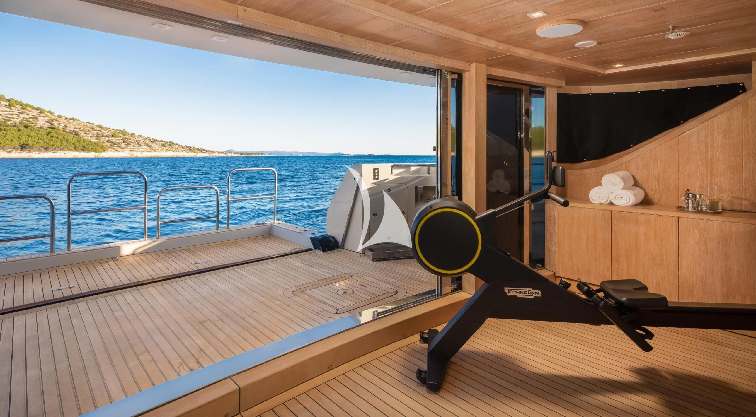 a boat on a deck aboard LAMMOUCHE Yacht for Sale
